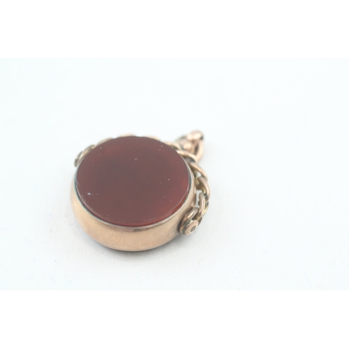 192 - 9ct gold antique carnelian and bloodstone spinner fob (7.8g)