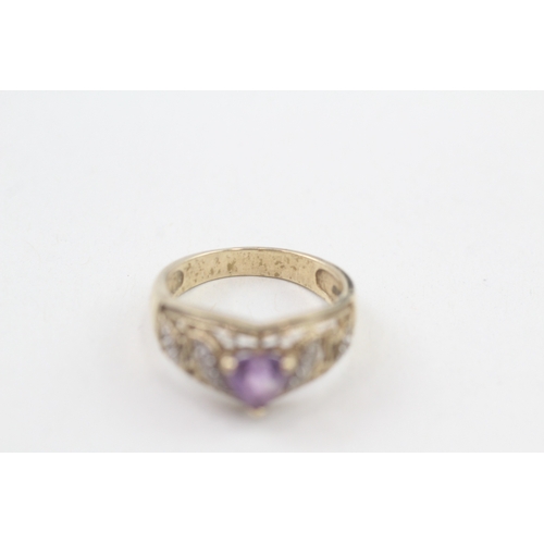 194 - 9ct gold diamond & amethyst heart ring (3.4g) Size  M