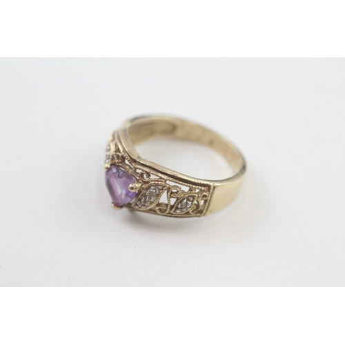 194 - 9ct gold diamond & amethyst heart ring (3.4g) Size  M