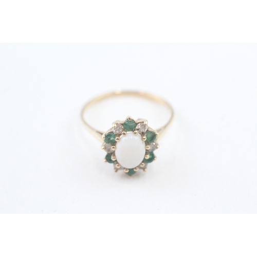 207 - 9ct gold emerald, opal and cubic zirconia halo dress ring (2.3g) Size  R