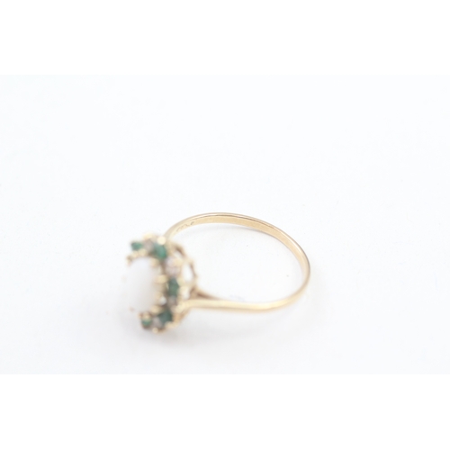 207 - 9ct gold emerald, opal and cubic zirconia halo dress ring (2.3g) Size  R