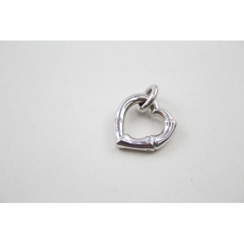 218 - Silver heart pendant with bamboo style by designer Gucci