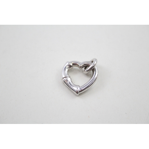 218 - Silver heart pendant with bamboo style by designer Gucci