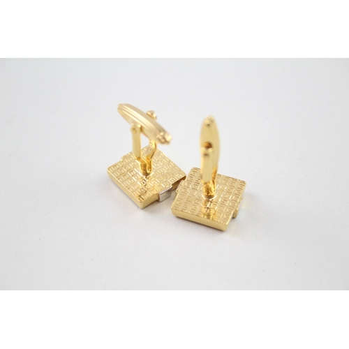 225 - Pair of gold tone cufflinks by designer Givenchy