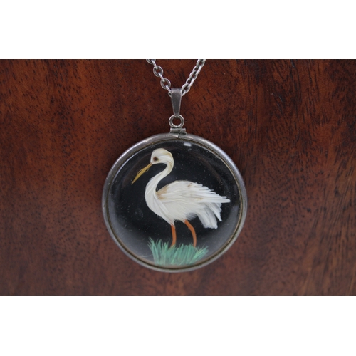 234 - Silver antique double sided bird pendant with chain