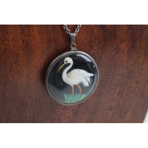 234 - Silver antique double sided bird pendant with chain