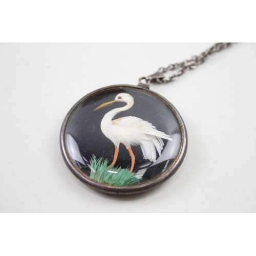 234 - Silver antique double sided bird pendant with chain