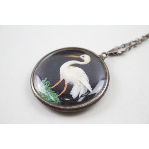 234 - Silver antique double sided bird pendant with chain