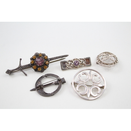 238 - Five silver Scottish/Celtic brooches including gemstone