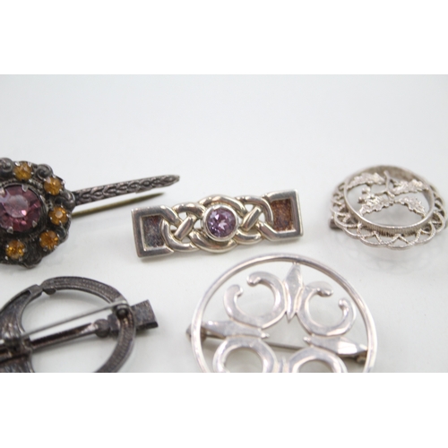 238 - Five silver Scottish/Celtic brooches including gemstone