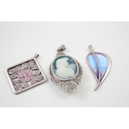 243 - Three silver pendants including enamel