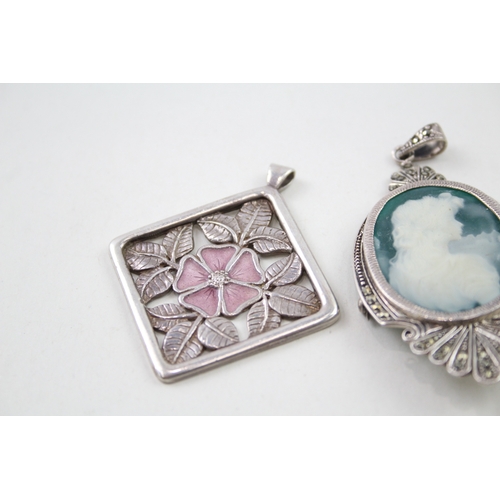 243 - Three silver pendants including enamel