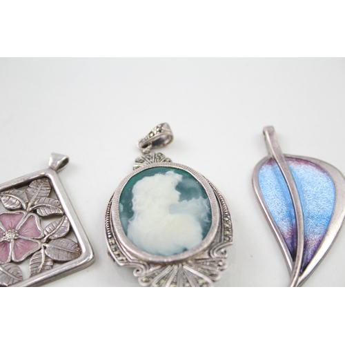 243 - Three silver pendants including enamel