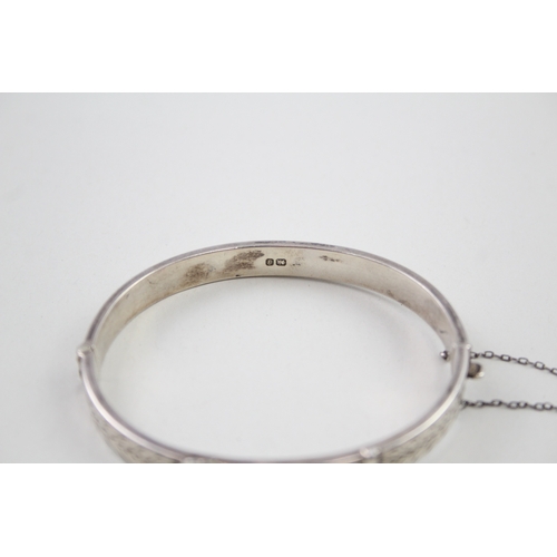 245 - Silver vintage bangle with buckle design