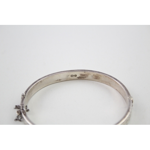 245 - Silver vintage bangle with buckle design