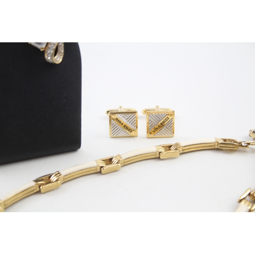 246 - A collection of gold tone jewellery by designer Nina Ricci