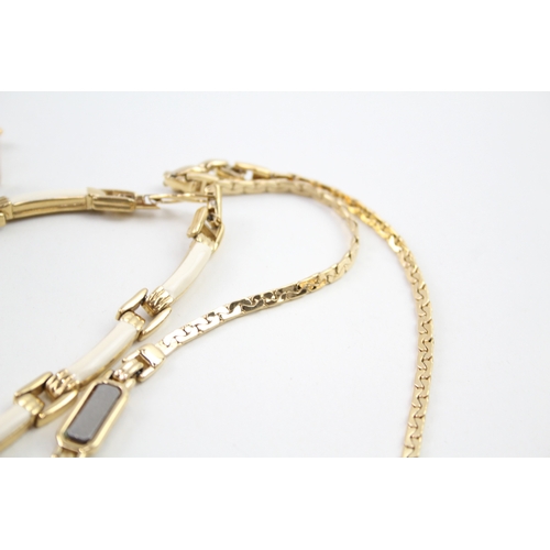 246 - A collection of gold tone jewellery by designer Nina Ricci