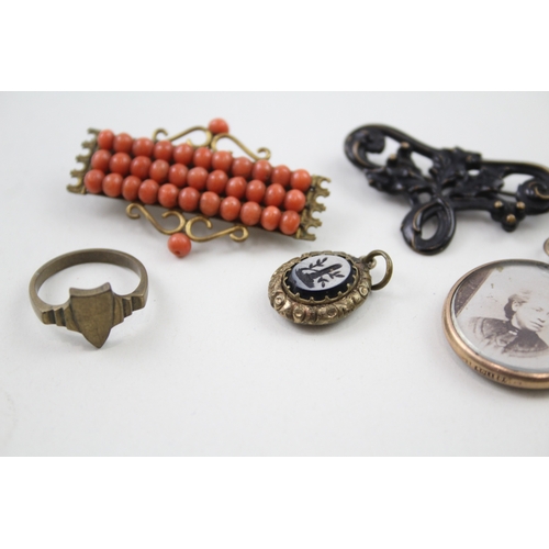 254 - A collection of antique jewellery including Coral