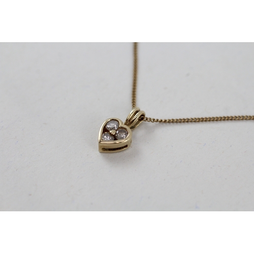 47 - 9ct gold diamond heart pendant with 9ct gold chain (1.7g)