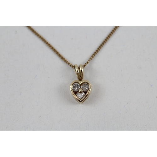 47 - 9ct gold diamond heart pendant with 9ct gold chain (1.7g)