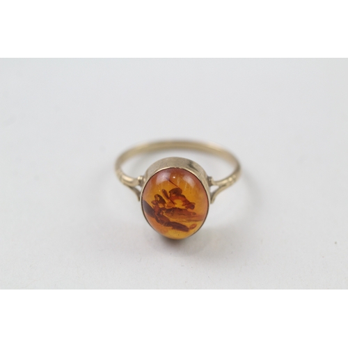 50 - 9ct gold oval cabochon Baltic amber ring with sun spangles (2g) Size  P