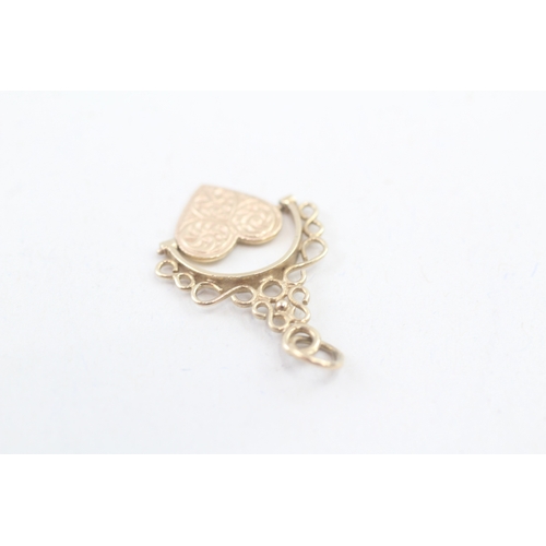 57 - 9ct gold heart swivel fob pendant (0.9g)