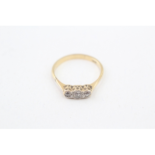 63 - 18ct gold old cut diamond three stone ring (2g) Size  L