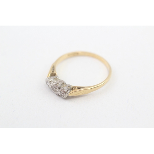 65 - 18ct gold mixed cut diamond three stone ring (2.5g) Size  Q