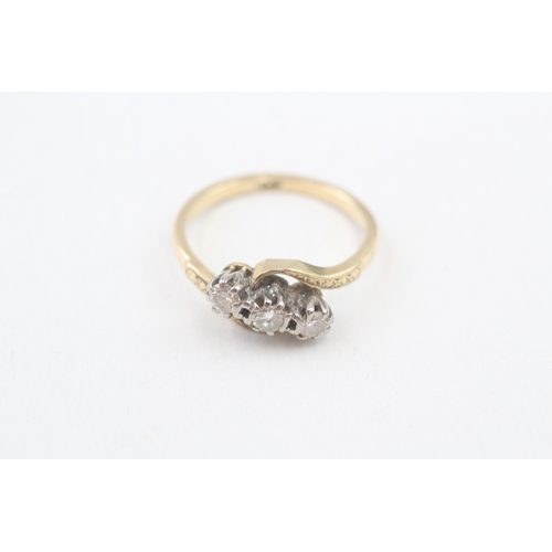 66 - 18ct gold diamond three stone ring (3.7g) Size  P