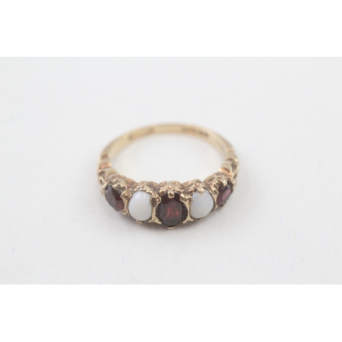 69 - 9ct gold garnet & opal five stone ring (2.7g) Size  L