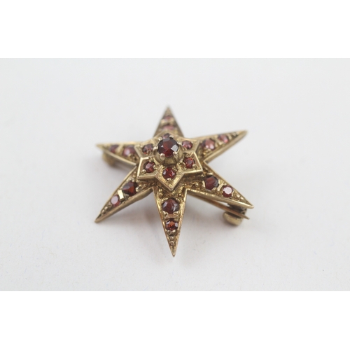 74 - 9ct gold vintage garnet star brooch (3.4g)