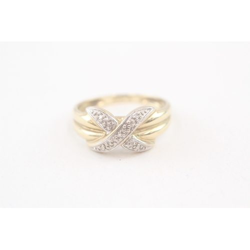 89 - 9ct gold diamond cross-over ring (2.3g) Size  P 1/2