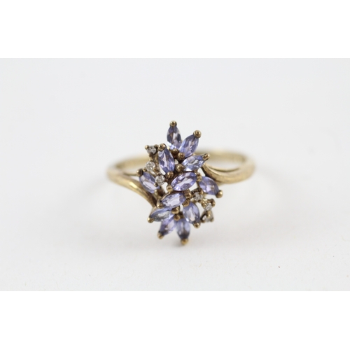 97 - 9ct gold tanzanite & diamond dress ring (2.6g) Size  T