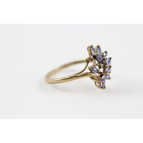 97 - 9ct gold tanzanite & diamond dress ring (2.6g) Size  T