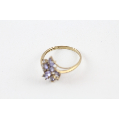 97 - 9ct gold tanzanite & diamond dress ring (2.6g) Size  T