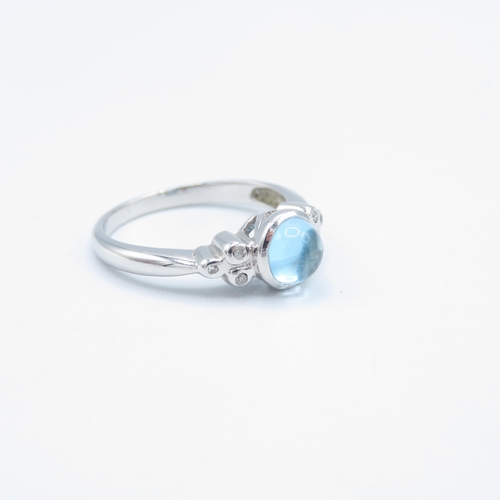 110 - 9ct white gold blue topaz and diamond ring (2.9g) Size  N 1/2