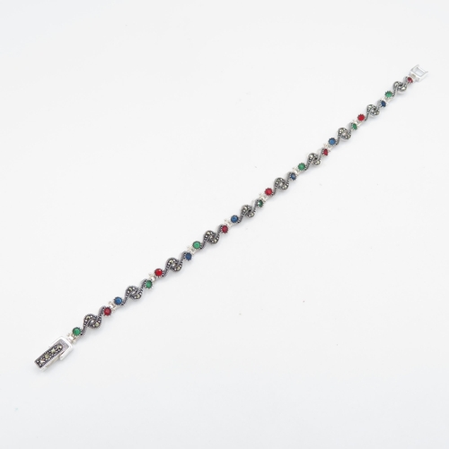 263 - HM 925 Sterling Silver bracelet set with green, blue and red stones (12g) in excellent condition - m... 