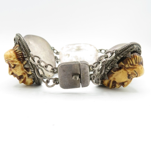 280 - Silver and bone antique carved bracelet and pendant in oriental design