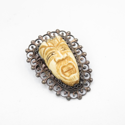 280 - Silver and bone antique carved bracelet and pendant in oriental design