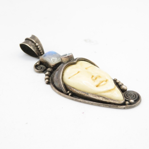 286 - Art deco style carved bone and silver moonstone pendant (16.6g) 75mm long