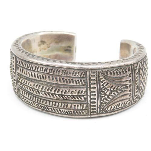 296 - Collection of foreign silver bangles (109g)