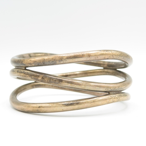 297 - 2 x Brutalist silver him bangles (80g)