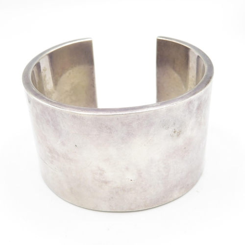 311 - 2 x Large silver cuff bangles (103g)