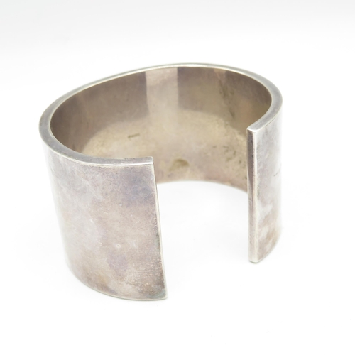 311 - 2 x Large silver cuff bangles (103g)