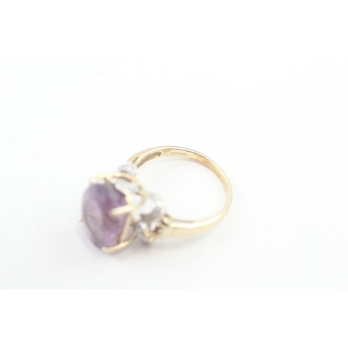 109 - 9ct gold amethyst and diamond cocktail ring (3.9g) Size  O