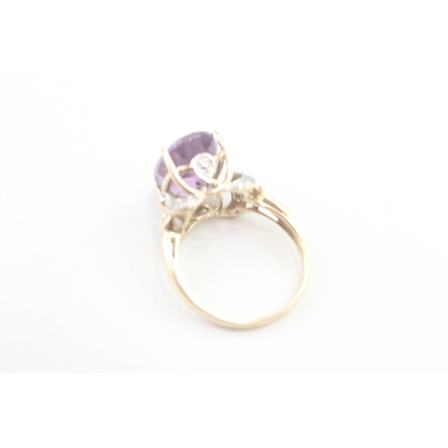 109 - 9ct gold amethyst and diamond cocktail ring (3.9g) Size  O