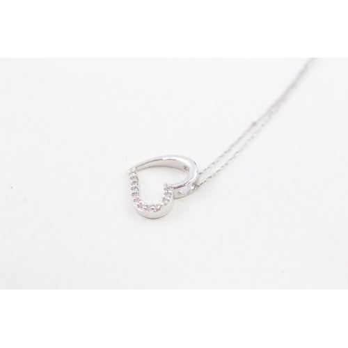 114 - 9ct white gold heart pendant with9ct white gold chain (1.3g)