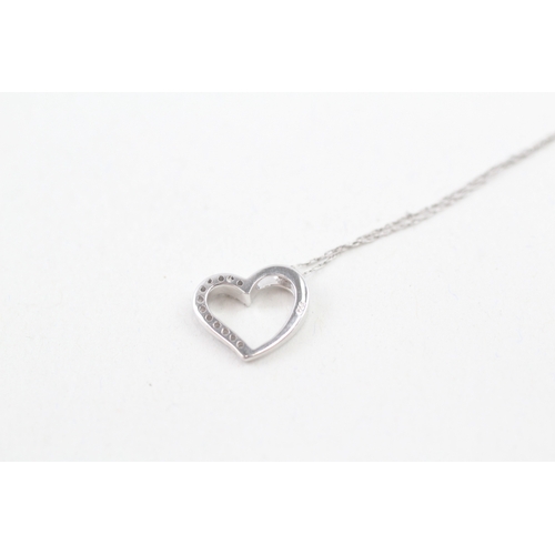 114 - 9ct white gold heart pendant with9ct white gold chain (1.3g)