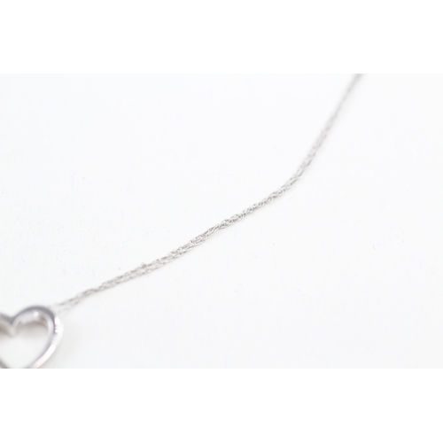 114 - 9ct white gold heart pendant with9ct white gold chain (1.3g)