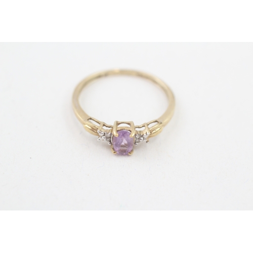 149 - 9ct gold amethyst single stone ring with diamond sides (1.8g) Size  O